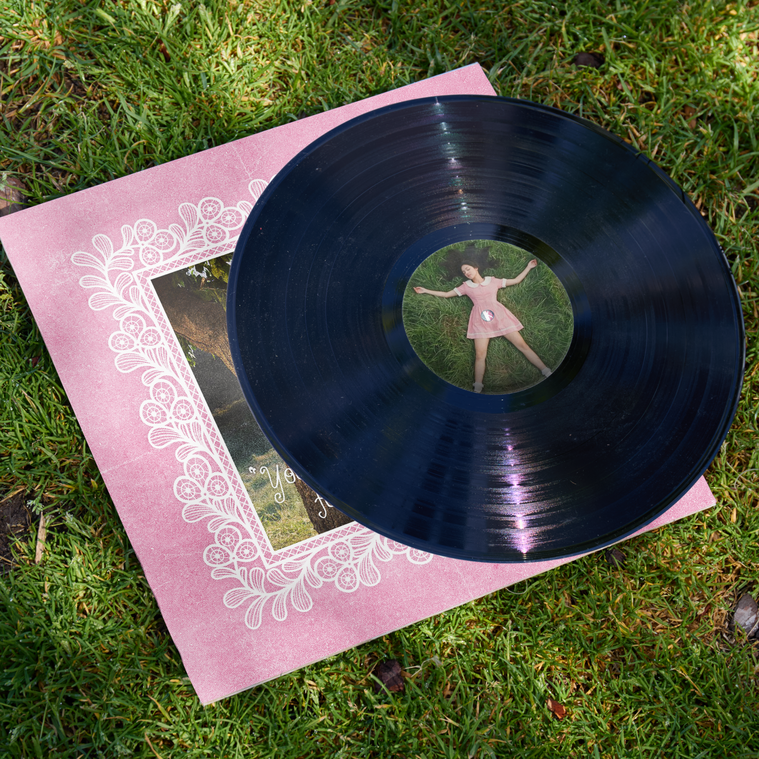 Vinyl and postcard together
